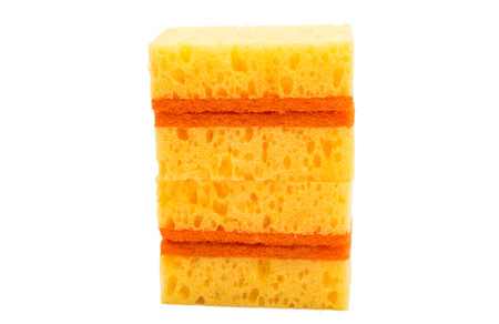 Yellow kitchen sponge isolated on white backgroundの写真素材