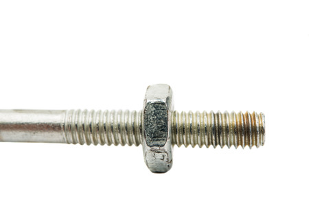 screw and nut on a white backgroundの写真素材