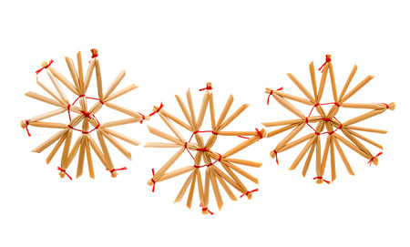 Straw christmas ornament, handmade, on white background
