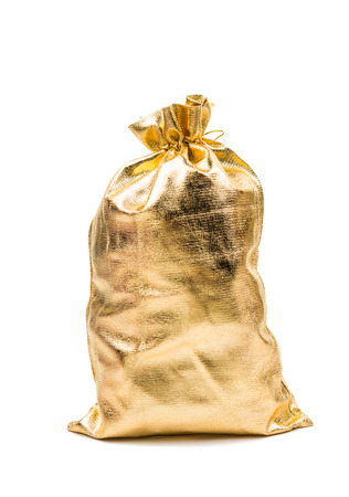 Golden bag with gift on a white backgroundの写真素材