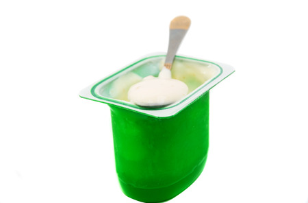yogurt in plastic box on white backgroundの写真素材
