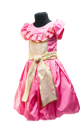 pink baby dress on a white backgroundの写真素材