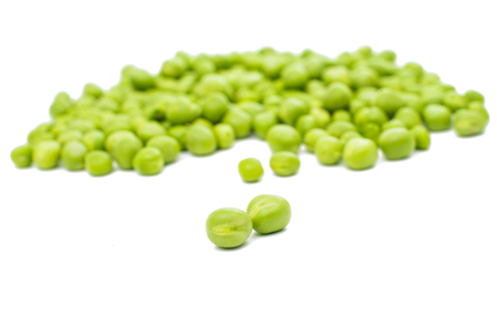 green peas isolated on white backgroundの写真素材