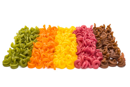 colored pasta on white backgroundの写真素材