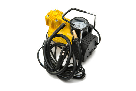 The automobile compressor isolated on a white background