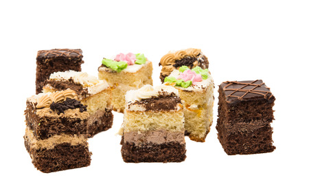 a piece of sponge cake isolated on white backgroundの写真素材