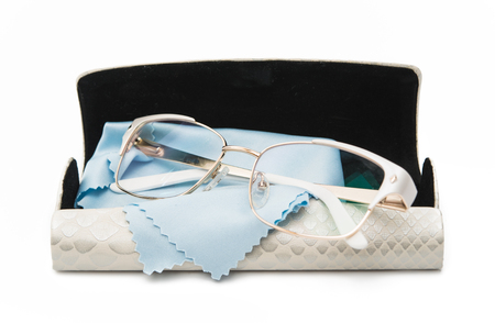 glasses in a case isolated on white backgroundの写真素材