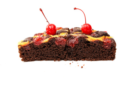 chocolate fruit cake isolated on white backgroundの写真素材