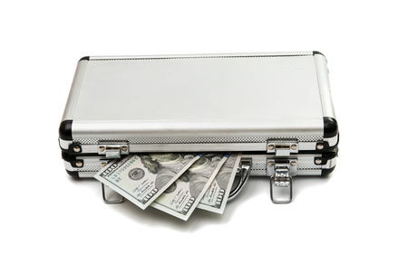 Silver case with dollars on a white background.の写真素材
