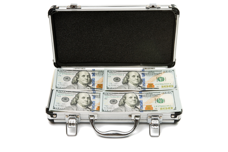 Silver case with dollars on a white background.の写真素材