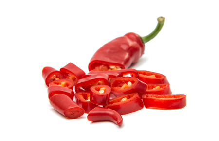 Red chili peppers on a white backgroundの写真素材