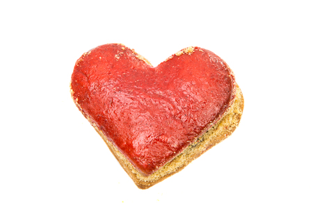 Cookies hearts in red icing isolated on white backgroundの写真素材