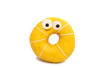 delicious donuts in color glaze isolated on white backgroundの写真素材