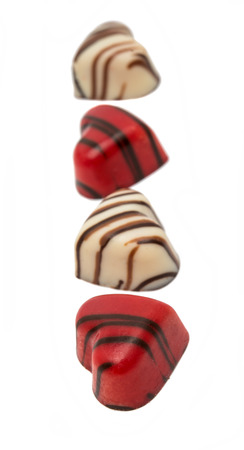 chocolate candy heart isolated on white backgroundの写真素材