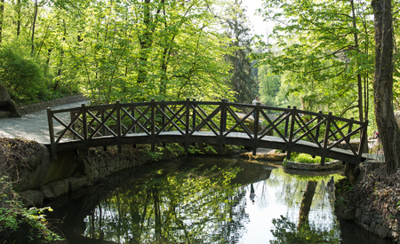 Old wooden bridge in the parkの写真素材