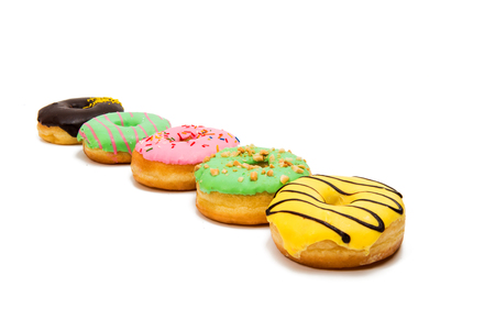 Glazed donuts on white backgroundの写真素材