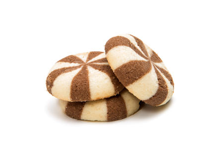 Striped cookies with chocolate filling on a white backgroundの写真素材