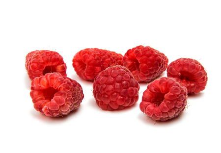 Fresh raspberries isolated on white background