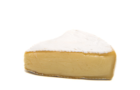 Brie cheese isolated on a white backgroundの写真素材