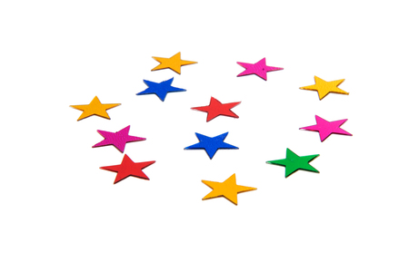 confetti background of small colored starsの写真素材