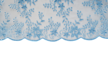 background from the texture of the material with embroideryの写真素材