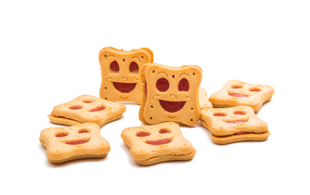 Home made cookies smiley  isolated on white backgroundの写真素材