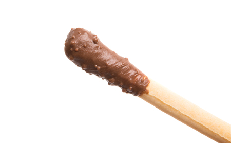 stick with chocolate glaze on a white backgroundの写真素材