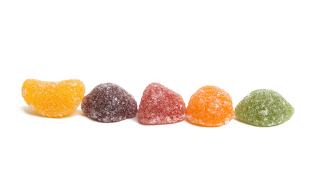 Fruit jelly candies on a white background