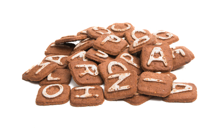 biscuits with letters isolated on white backgroundの写真素材