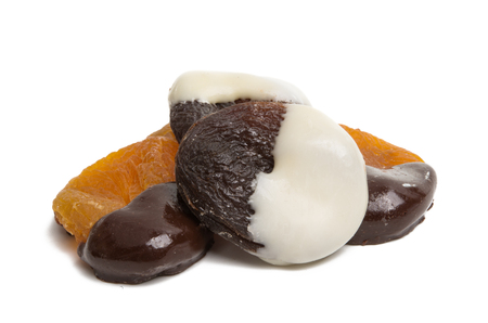 dry fruits in chocolate isolated on white backgroundの写真素材