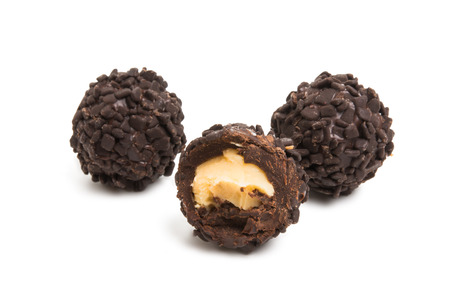 chocolate truffles isolated on white backgroundの写真素材