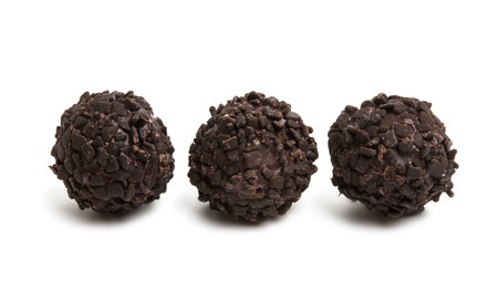 chocolate truffles isolated on white backgroundの写真素材