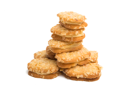 nut cookies with cream isolated on white backgroundの写真素材