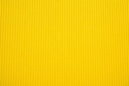 background of colored corrugated cardboardの写真素材