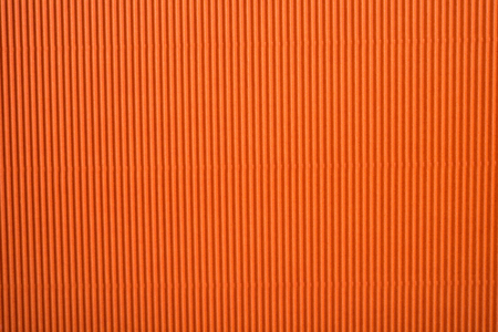 background of colored corrugated cardboardの写真素材