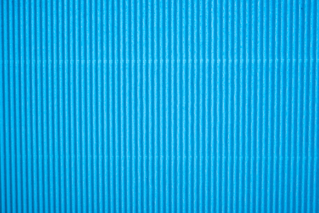 background of colored corrugated cardboardの写真素材