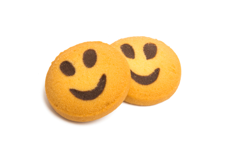 home cookie smiley isolated on white backgroundの写真素材