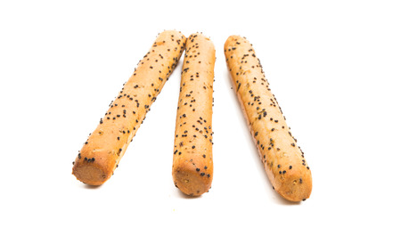 sticks with poppy seeds isolated on white backgroundの写真素材