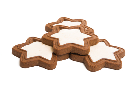 gingerbread star cookie isolated on white backgroundの写真素材