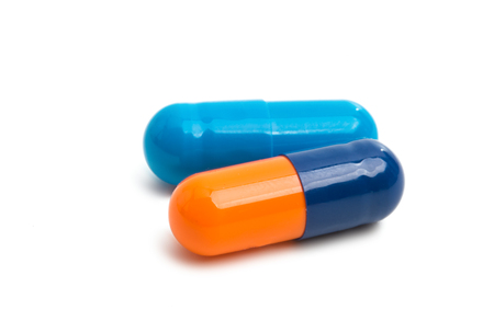 capsules isolated on white backgroundの写真素材