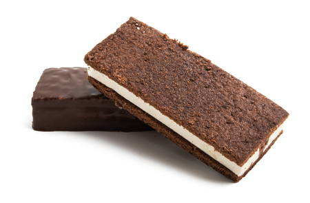 chocolate sponge cake with milk souffle isolated on white backgroundの写真素材