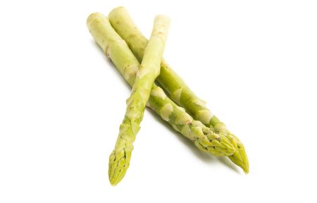 green asparagus isolated on white backgroundの写真素材