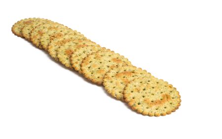 salted cracker with herbs isolated on white background