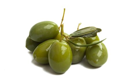 green large olives Isolated on a white backgroundの写真素材