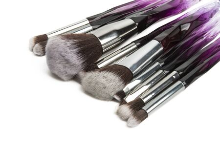 set of makeup brushes isolated on white background