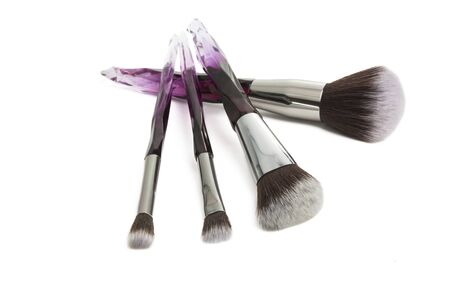 set of makeup brushes isolated on white background