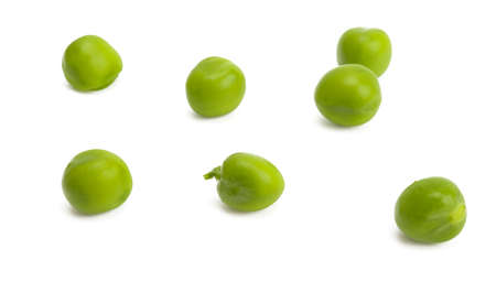 green peas isolated on white backgroundの写真素材