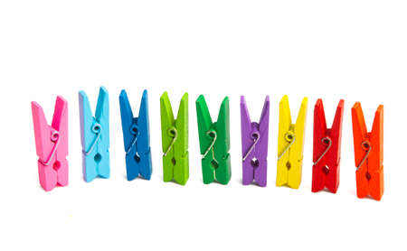 colorful clothespins isolated on white background