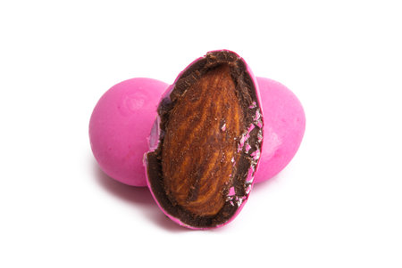 almonds in chocolate glaze isolated on white background