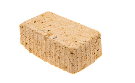 halva with pistachios isolated on white background